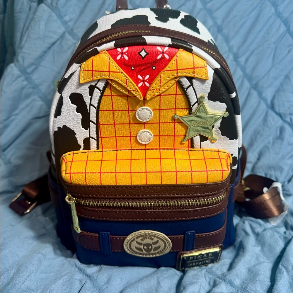 LOUNGEFLY PIXAR Toy Story Themed Backpack with Brown and Yellow Accents
